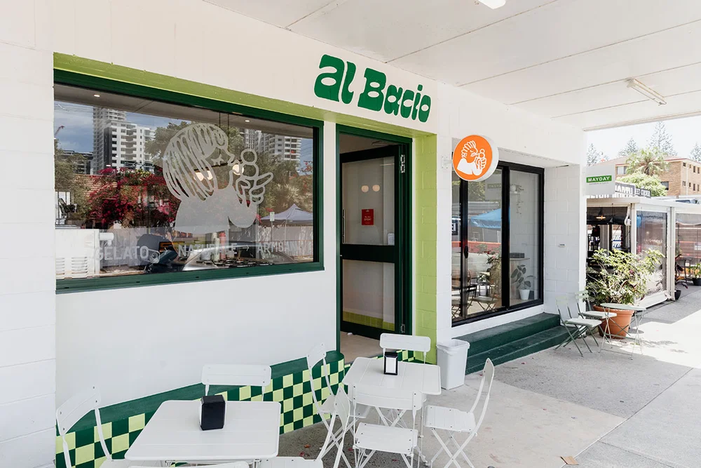 Green and white shopfront of Al Bacio Gelato Naturale